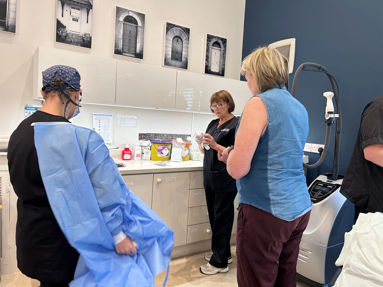 Surgeon with a patient at Bloomfield Laser Clinic
