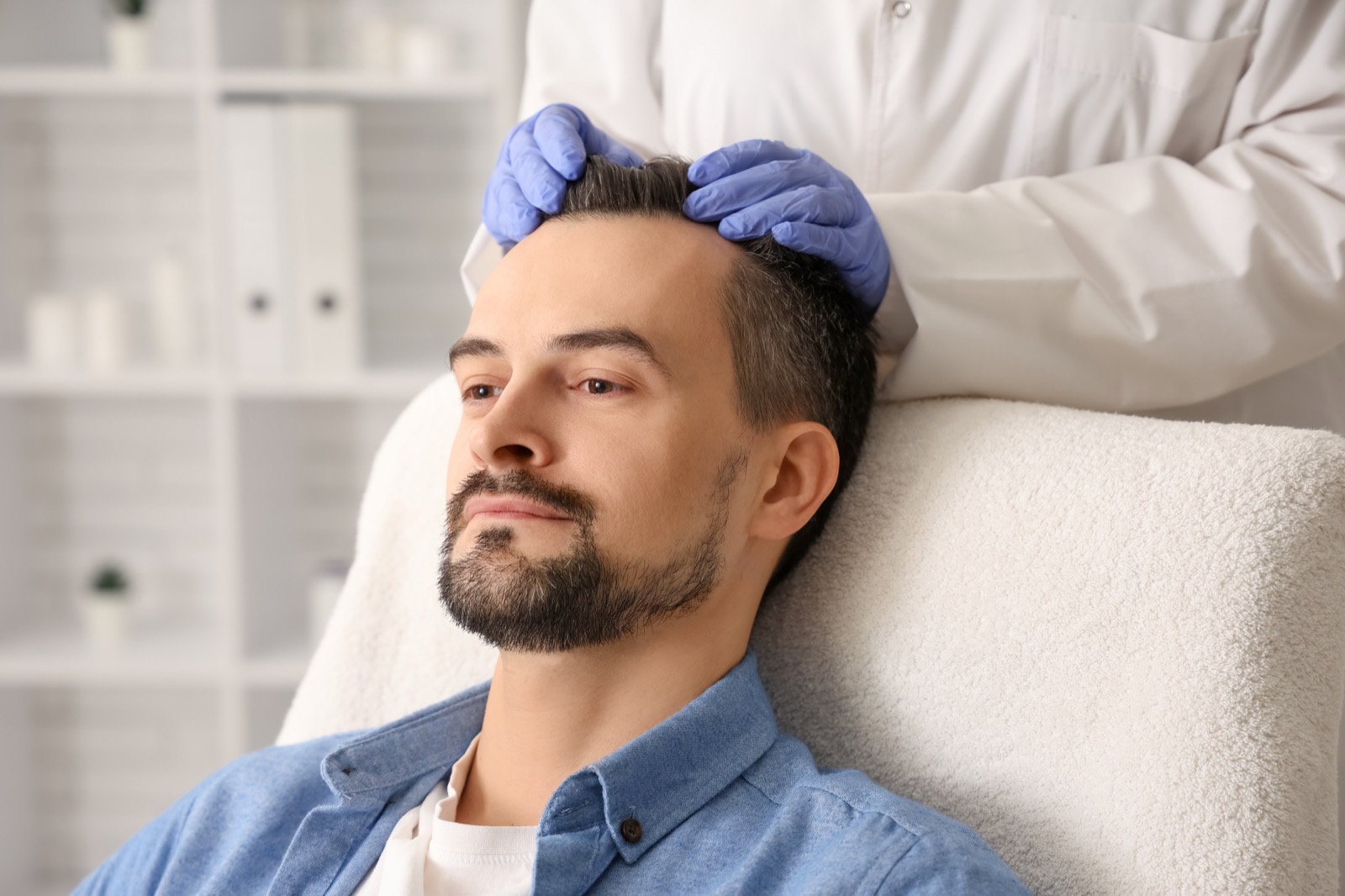 Scalp examination at a hair loss clinic